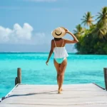 몰디브 직항 항공편 - **Prompt:** A joyful young woman, wearing a stylish, modest two-piece swimsuit under a sheer white c...